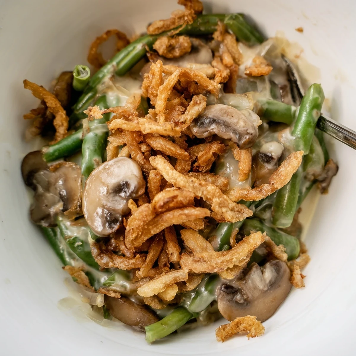 Classic Old-School Green Bean Casserole, a comforting dish with savory mushrooms and creaminess.  