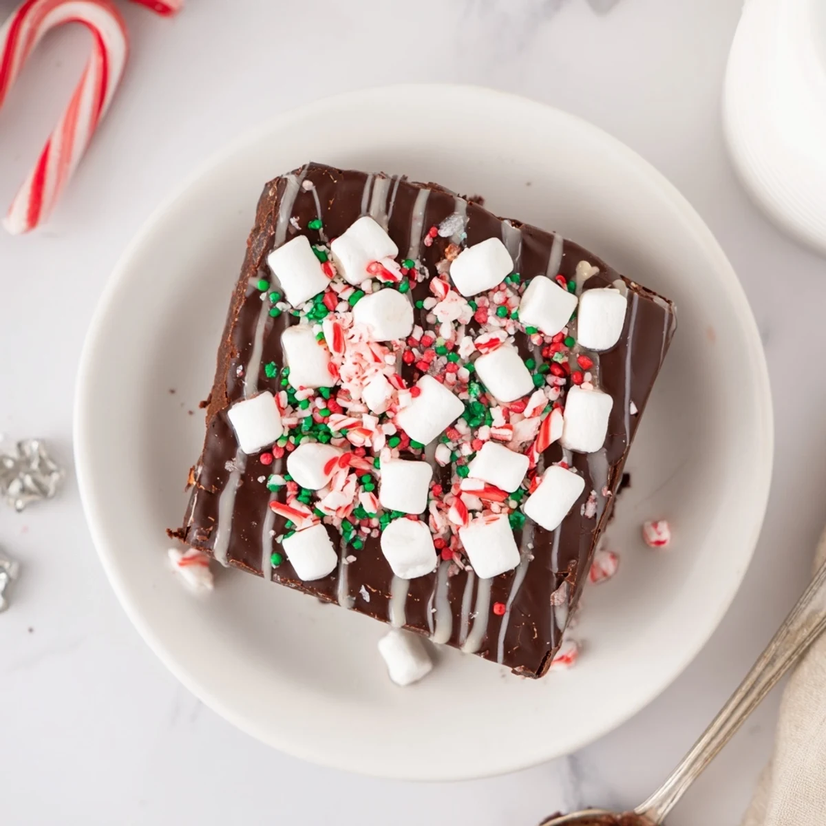 Close-up of decadent Hot Chocolate Bomb Bark, showcasing swirls of white chocolate and marshmallows.