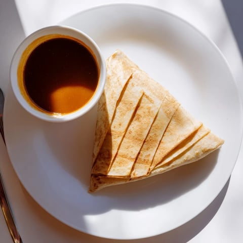 Golden-brown Turkey, Stuffing & Cranberry Leftovers Tortilla Wrap, crispy from the skillet, ready to eat!