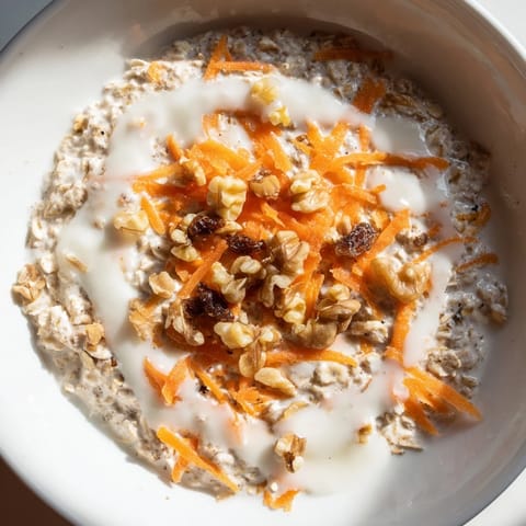 A close-up of Carrot Cake Overnight Oats showcases grated carrots and warm spices perfectly.