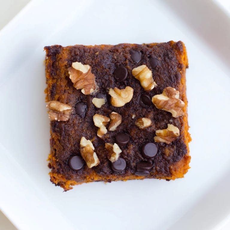 A close-up of delicious, fudgy sweet potato brownies, perfect for a gluten-free dessert option.